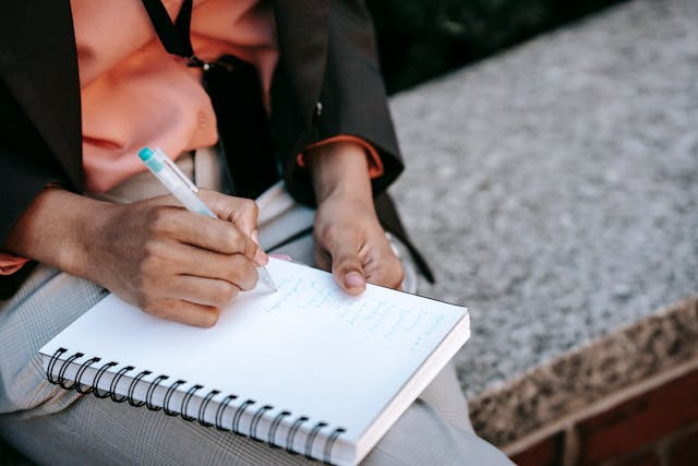 tenant-writing-in-notebook